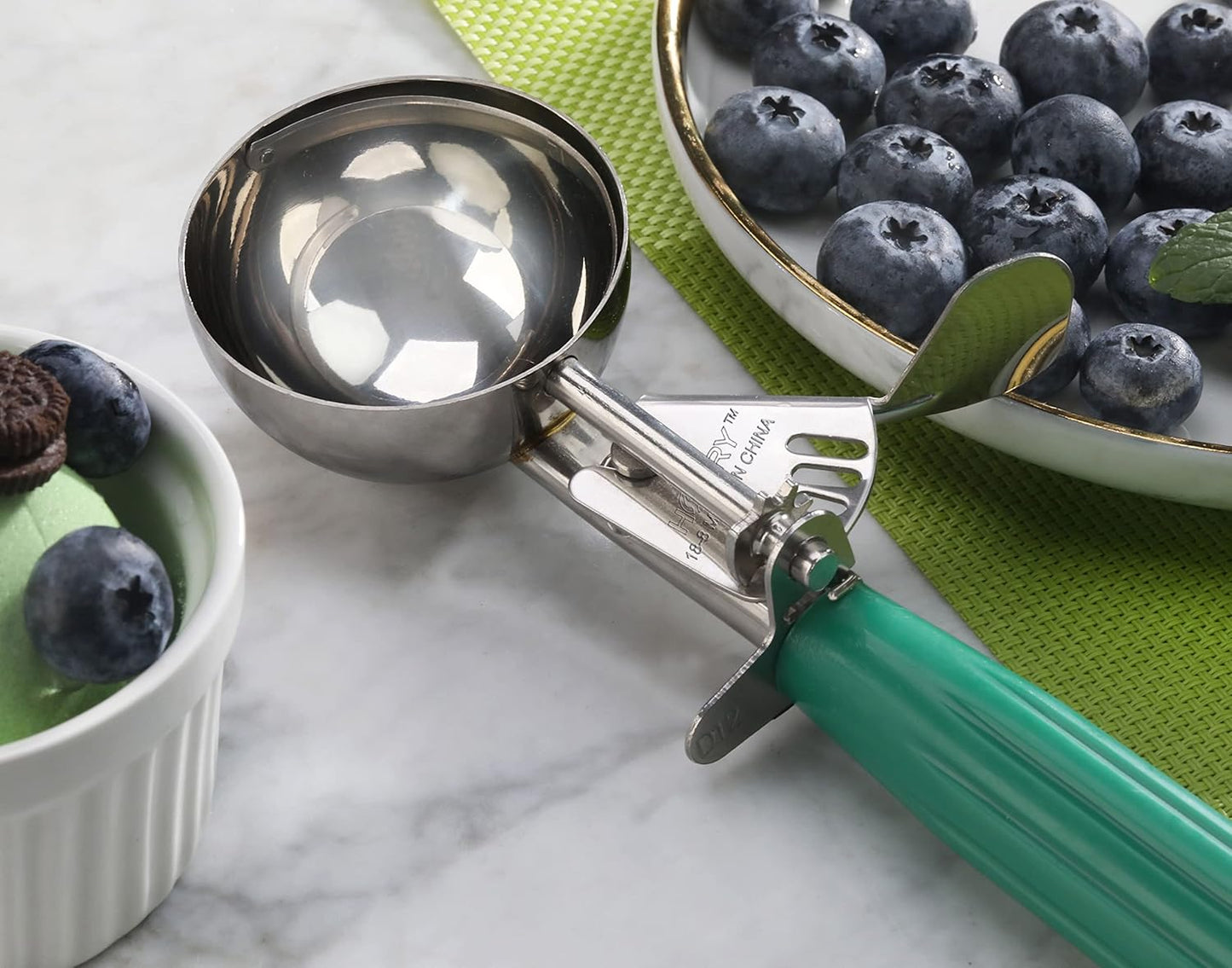 New Star Foodservice 34806 Commercial-Grade Thumb Press Food Disher/Ice Cream Scoop, 18/8 Stainless Steel, 3.25 oz, Size 12, Green